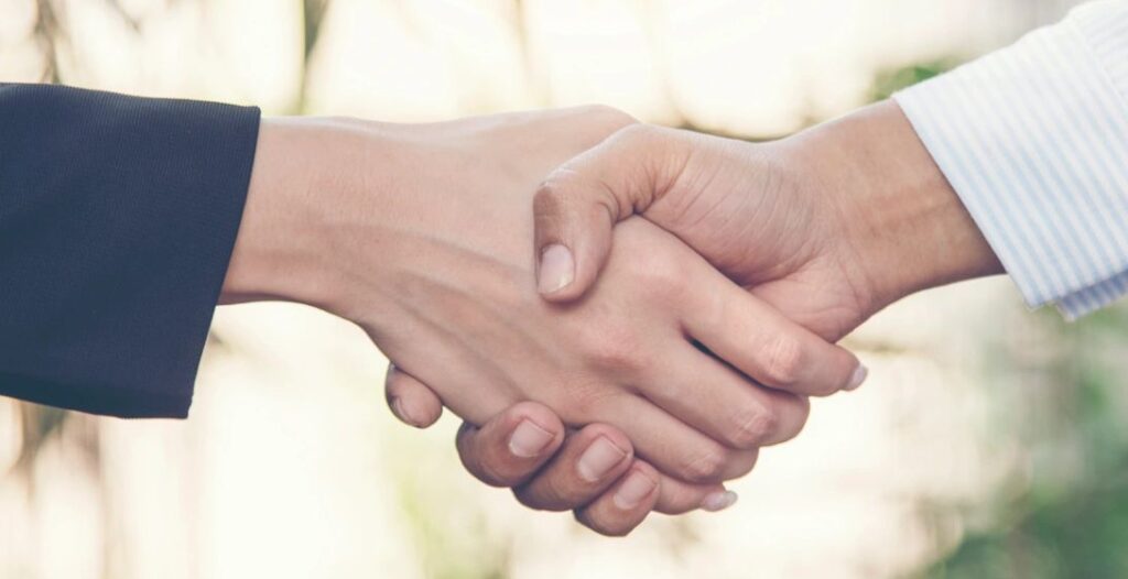 Banner Trust honesty business customer handshake together promise partner. Panorama Businessman teamwork diversity solidarity team Partner hands together. Team meeting shaking hands with copy space